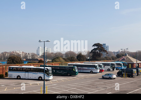 Coaches in the vehicle park to the D-Day museum. Stock Photo