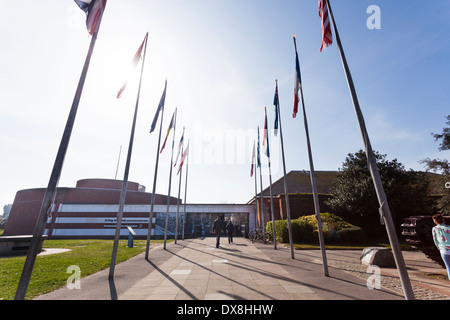 Flagpoles lining the entrance to the D-Day Museum at Southsea. Stock Photo