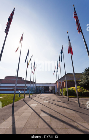 Flagpoles lining the entrance to the D-Day Museum at Southsea. Stock Photo