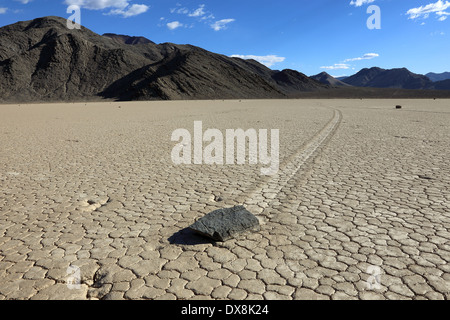 A traveling rock on the Racetrack Playa of Death Valley California Stock Photo