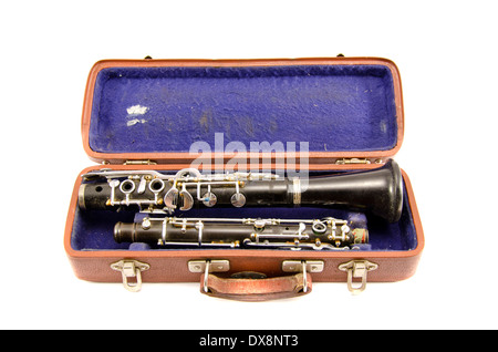 old used musical instrument clarinet in ancient case isolated on white Stock Photo