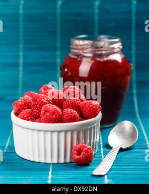 Raspberry and homemade jam in jar Stock Photo