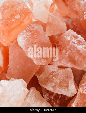 Himalayan pink crystal salt background Stock Photo