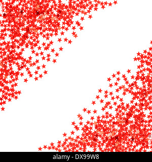 star shaped red confetti on white background. festive background Stock Photo