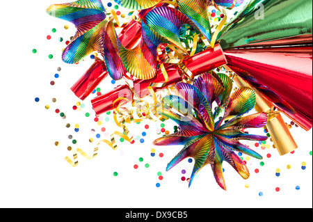 colorful decoration with garlands, streamer, cracker, party hats and confetti. festive background Stock Photo