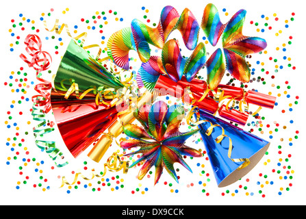 colorful background with garlands, streamer, cracker, party hats and confetti. festive decoration Stock Photo