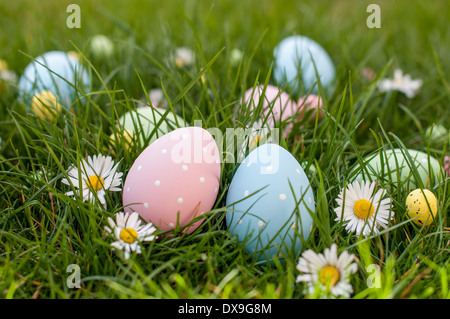 Different color Easter egg on a grass Stock Photo