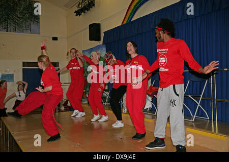 West Wickham,UK. 21st Mar, 2014. West Wickham Sainsbury's Staff and local school kids raise funds for Sport Relief by taking part in a Zumbatomic class run by Stephaneez School of Dance Credit:  Keith Larby/Alamy live News Stock Photo