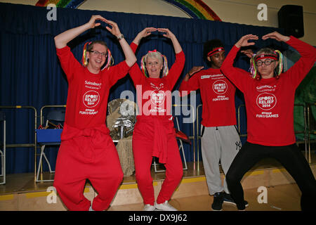 West Wickham,UK. 21st Mar, 2014. West Wickham Sainsbury's Staff  raise funds for Sport relief ty taking  part in a Zumbatomic class run by Stephaneez School of Dance Credit:  Keith Larby/Alamy live News Stock Photo