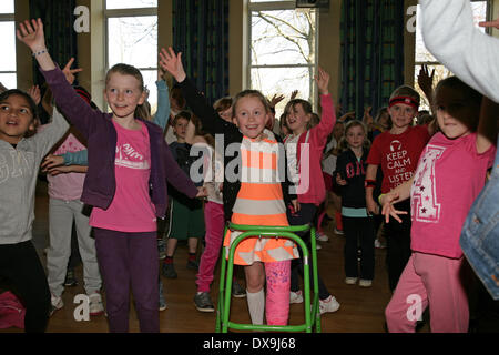 West Wickham,UK. 21st Mar, 2014. West Wickham Sainsbury's Staff and local school children raise funds for Sport Relief by taking part in a Zumbatomic class run by Stephaneez School of Dance Credit:  Keith Larby/Alamy live News Stock Photo