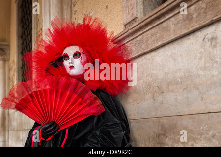 A woman dressed for the Carnival in Venice, Italy Stock Photo