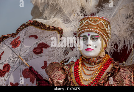 A woman dressed up for the Carnival in Venice, Italy Stock Photo