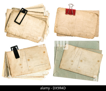 old postcards and envelopes isolated on white background. vintage paper sheets Stock Photo