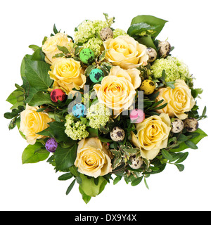 Easter roses bouquet with colored eggs isolated on white background Stock Photo