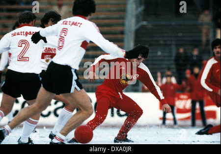 football, Bundesliga, 1981/1982, Rhine Stadium, Fortuna Duesseldorf versus VfB Stuttgart 2:3, scene of the match, snow-covered pitch, Thomas Allofs (Fortuna) Stock Photo