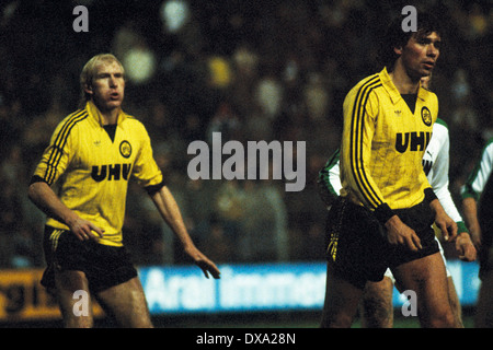 football, Bundesliga, 1982/1983, Stadium am Boekelberg, Borussia Moenchengladbach versus Borussia Dortmund 2:3, scene of the match, Rolf Ruessmann (BVB) left and Meinolf Koch (BVB) Stock Photo