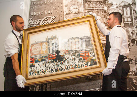 Sotheby's, London, UK. March 21st 2014. Sotheby's workers hang LS Lowry's Piccadilly Circus, painted in 1961 and expected to fetch between £4-6 million at auction on March 25th as the AJ Thompson collection, the most comprehensive of Lowry's work, goes on sale. Credit:  Paul Davey/Alamy Live News Stock Photo