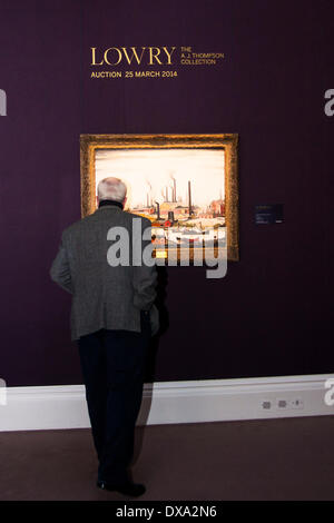 Sotheby's, London, UK. March 21st 2014. A man examines LS Lowry's "A River Bank", from the AJ Thompson collection, expected to fetch between £1.5-2.5 million at auction on March 25th. Credit:  Paul Davey/Alamy Live News Stock Photo