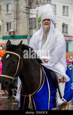 Kazakhstan,Petropavlovsk - MARCH 21, 2014: Muslim new year celebration, Kydyr Ata on horse Stock Photo