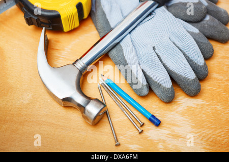 Set of DIY tools on wooden table. Stock Photo
