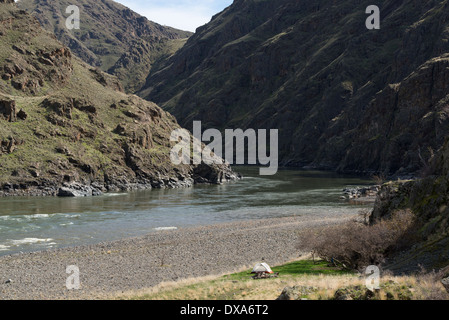 Backpacker's camp at the confluence of the Snake and Imnaha Rivers in Hells Canyon, on the Idaho/Oregon border. Stock Photo