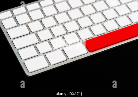 white blank keyboard with red button on black background Stock Photo