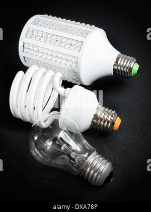 Three generations of light bulbs that are on the market in recent years. Stock Photo