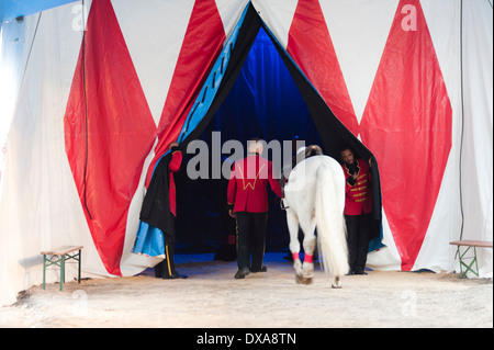 Artists and animal trainers are getting ready for their performane behind the stage of the Swiss national circus 'Knie'. Stock Photo