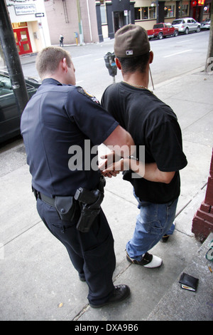 Police arresting and handcuffing a man in London Stock Photo - Alamy