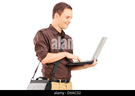 Young man working on laptop Stock Photo