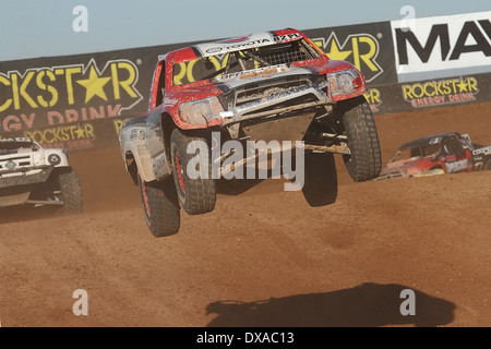 CHANDLER, AZ - OCT 28: Chris Brandt (82) over the big jump in the Lucas Oil Off Road Series racing Challenge Cup Stock Photo