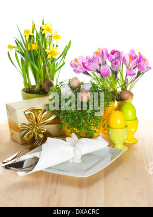 festive easter table setting with spring flowers and eggs decoration Stock Photo