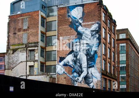 Mural by Guido van Helten depicting two badminton players on a building in Candleriggs area of Glasgow, created for the 2014 Commonwealth Games. Stock Photo