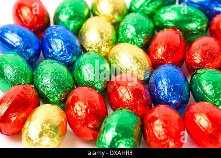 chocolate easter eggs in colorful foil. selective focus Stock Photo