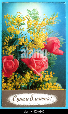 USSR - CIRCA 1985: Postcard printed in the USSR honoring International Women's Day of Solidarity shows roses,envelope,pigeon Stock Photo
