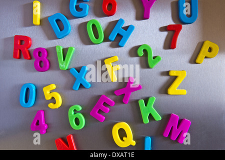 Colorful magnetic letters on refrigerator Stock Photo