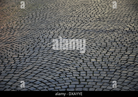 Ancient background of the cobbled road Stock Photo