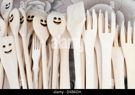 A bunch of woodens spoons on display, various shape, craftsmanship. Stock Photo