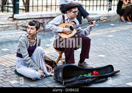 Musicians playing bouzouki in the street of Athens, Greece Stock Photo
