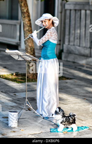 A musician playing flute in the street of Athens, Greece Stock Photo