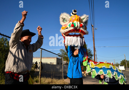 Dancers with the Chinese Cultural Center are coached before the start of the Tucson Rodeo Parade, Tucson, Arizona, USA. Stock Photo