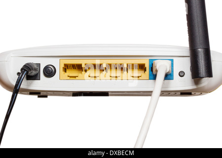 Router network hub with patch cable on isolated background Stock Photo