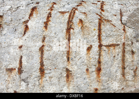 Concrete wall with rust spots, background Stock Photo