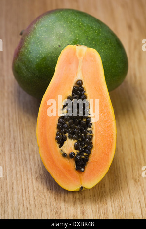Carica papaya and Mango portrait. Whole Mango and Pawpaw fruit. Stock Photo