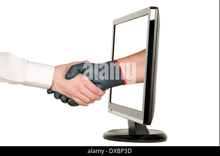 Industry worker with glove shakes hands with businessman on lcd monitor Stock Photo