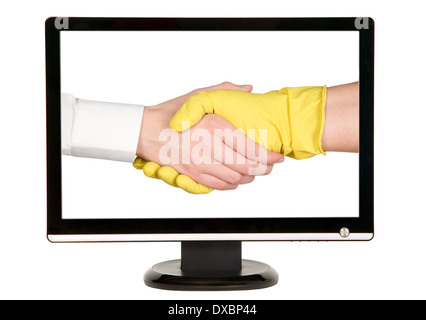 Industry worker with glove shakes hands with businessman on lcd monitor Stock Photo