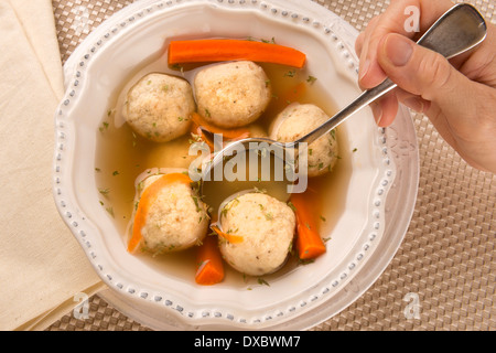 Traditional Matzah Ball Soup for Jewish Passover Stock Photo