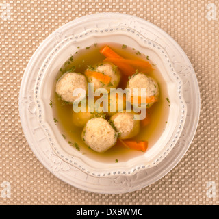 Traditional Matzah Ball Soup for Jewish Passover Stock Photo