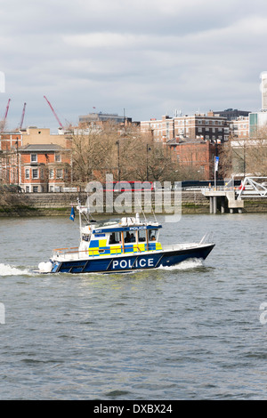 A police launch or boat on patrol on the River Thames London UK Stock Photo