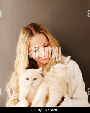 Girl and cats Stock Photo